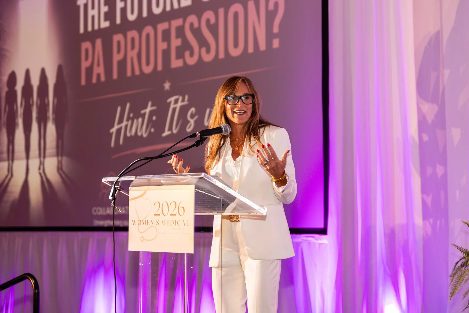 A speaker at the podium during the 2026 Women's Medical Summit